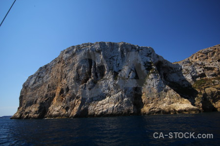 Rock cliff blue sea spain.