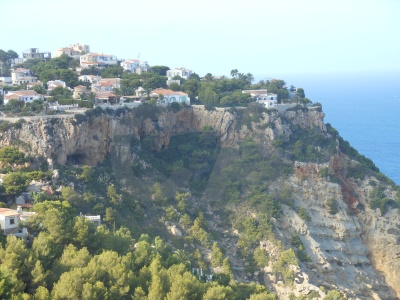 Rock cliff building spain water.