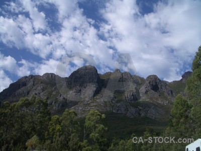 Rock cliff mountain landscape blue.