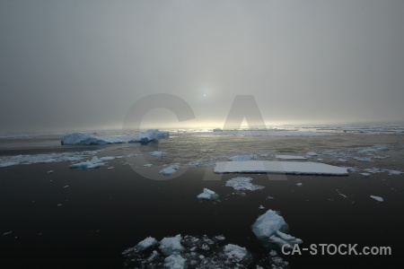 Sea ice sun sky iceberg south pole.