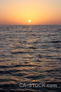 Sea water sunrise surface sun.