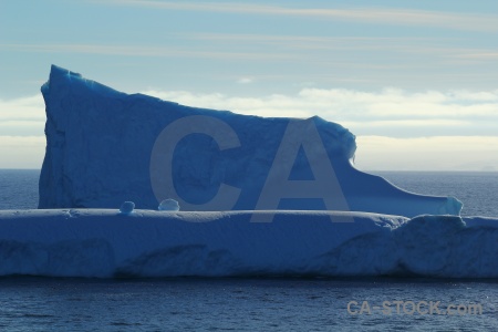 Sky antarctica cruise mountain iceberg water.