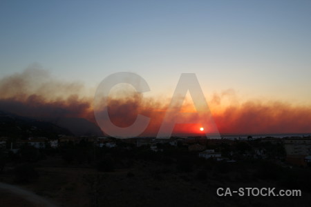 Spain sun sunset smoke montgo fire.