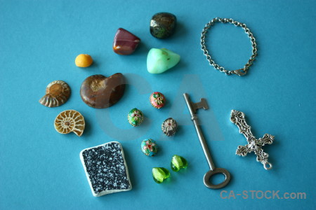 Stone shell key object cross.