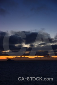 Sunset water mountain antarctic peninsula cloud.