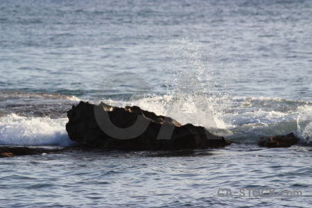 Surface rock sea wave water.