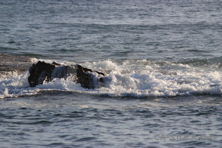 Surface water wave sea rock.