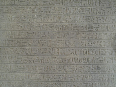 Texture gray stone hieroglyph.