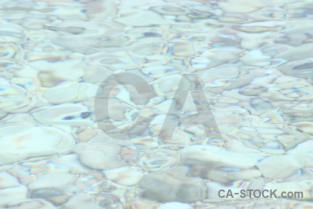 Texture white stone pool water.