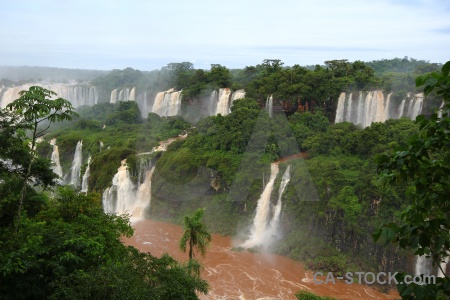 Unesco waterfall cloud tree brazil.