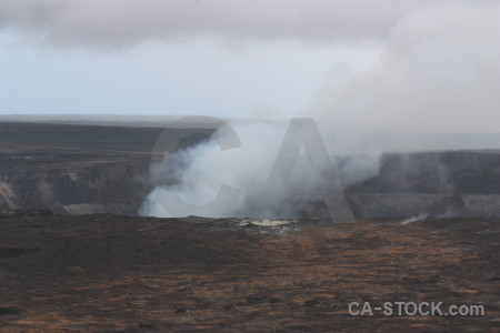 Volcanic gray landscape crater smoke.