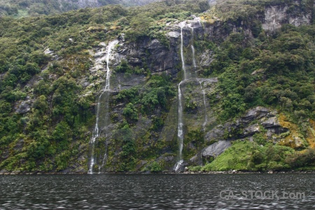 Waterfall doubtful sound mountain new zealand fiordland.
