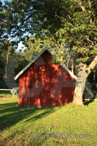 Yellow red green barn building.